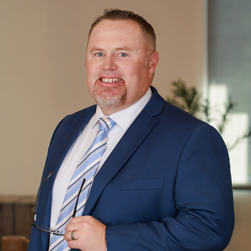 Jason Hooker, CPA - Managing Partner and Certified Public Accountant with extensive experience in accounting, tax preparation, and business advisory services.