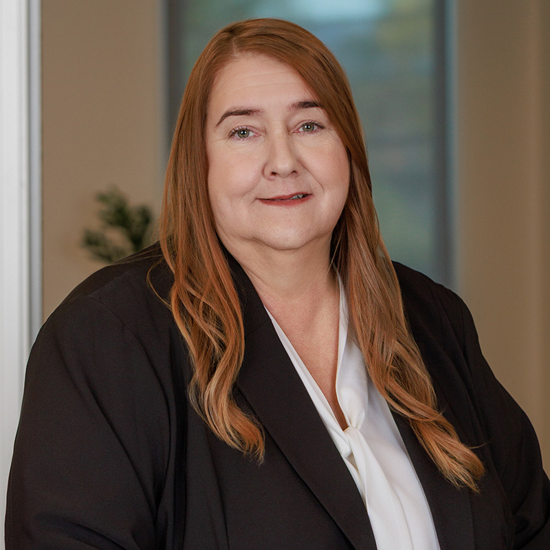 Headshot of Nina Carmen Lake, Enrolled Agent - taxation and accounting services team member.